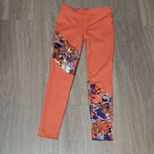 Nike Orange Leggings with Multicolor Abstract Design